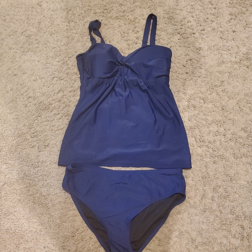 Navy blue tankini swimsuit set.